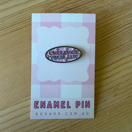 Unclench Your Jaw Enamel Pin